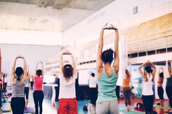 Photo of people in a yoga class